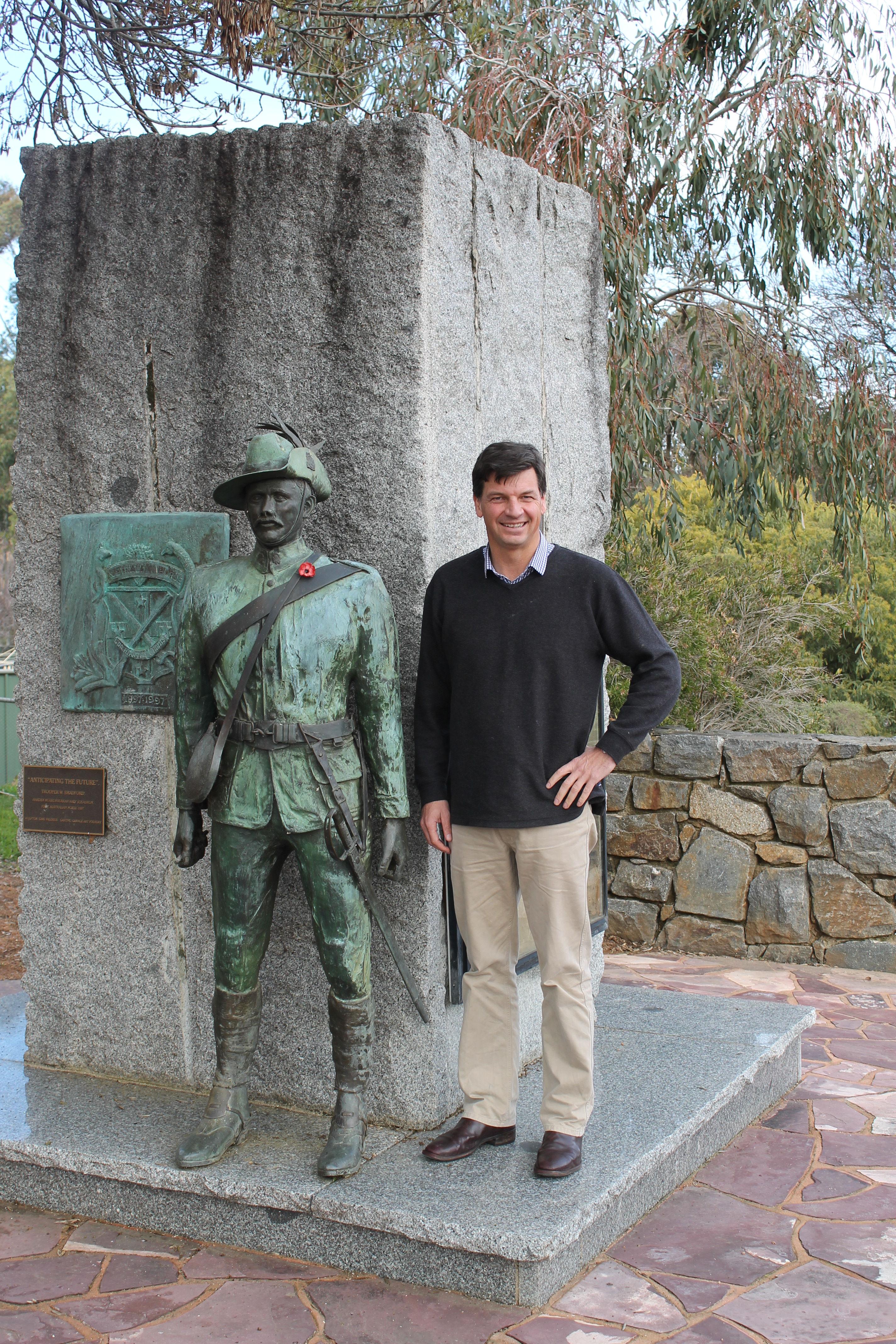 Federal Member for Hume Angus Taylor at the Murrumburrah Light Horse Memorial featuring the bronze statue of Trooper William Bradford of Murrumburrah.