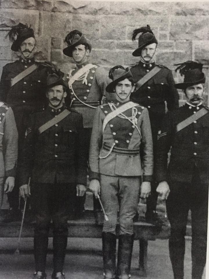 Men of the Australian Horse in dark green uniform with comrades of the NSW Lancers, who wore uniforms of khaki faced with red; date unknown. Their men are identified as: Top: Ryan, Byrnes, Warren.  Bottom: J O’Connell, Whitney Howard, Bailey, William Bradford.